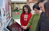 Заведующий отделом публикаций НАРБ У.А.Колобаева с посетителями выставки 001