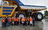 Коллектив НАРБ на фоне большегрузного автомобиля «БелАЗ» 004